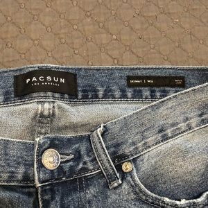 Men's distressed denim shorts